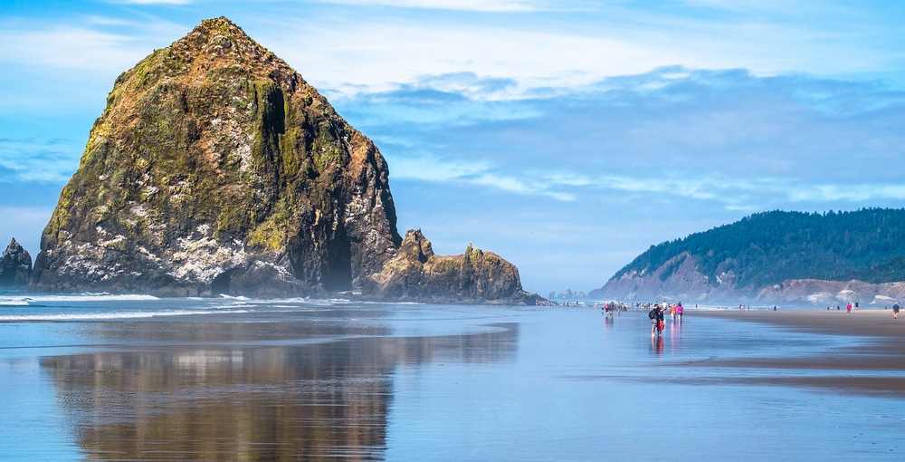 The Best Things to Do in Cannon Beach this Summer, photo of the iconic haystack rock near our Oregon Coast Bed and Breakfast