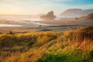 Cannon Beach Hikes, photo of Sunrise by the sea stacks of the Oregon coast Pacific ocean Cannon beach near our bed and breakfast